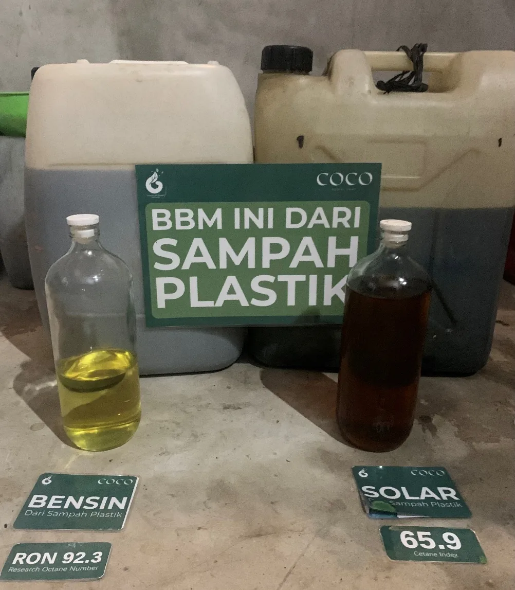 Bottles of gasoline and diesel made from plastic waste at the Cepaka plant, labelled RON 92.3 and Cetane Index 65.9